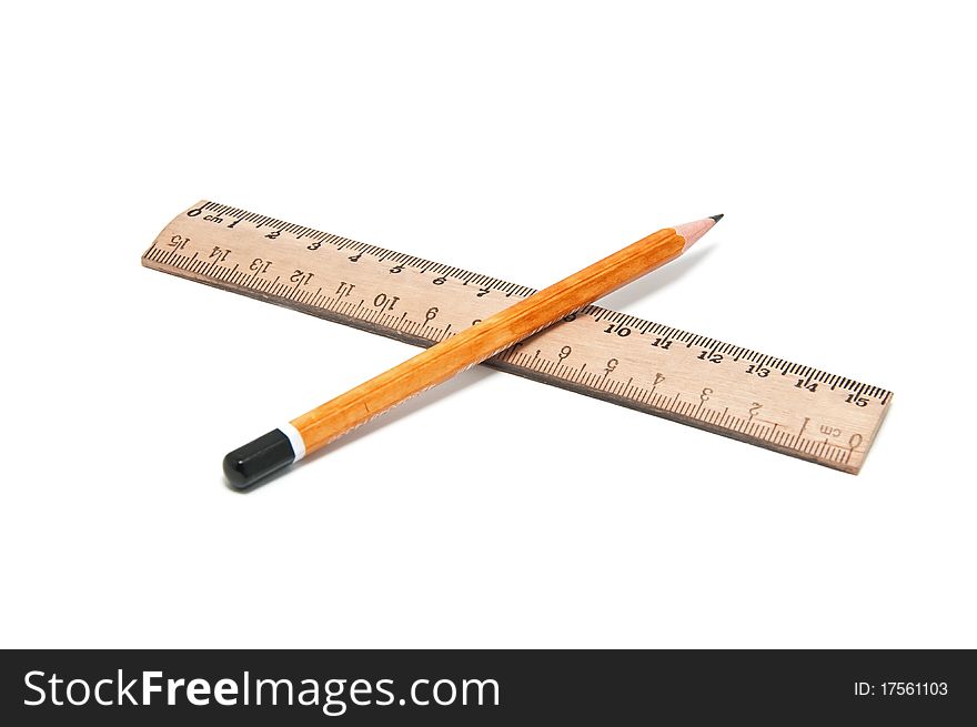 Ruler and pencil on a white background