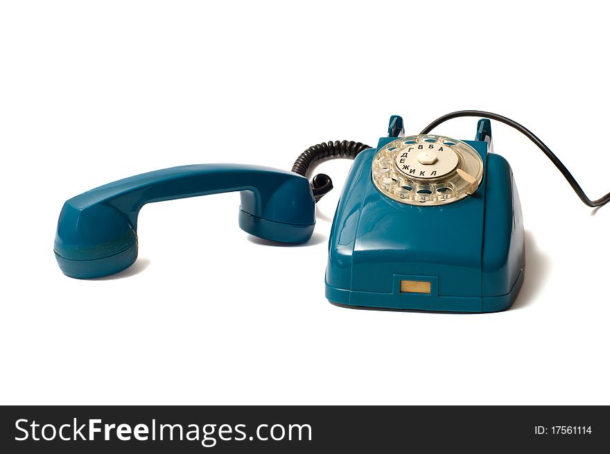 Old dial telephones with removed  receiver isolated on a white background. Old dial telephones with removed  receiver isolated on a white background.