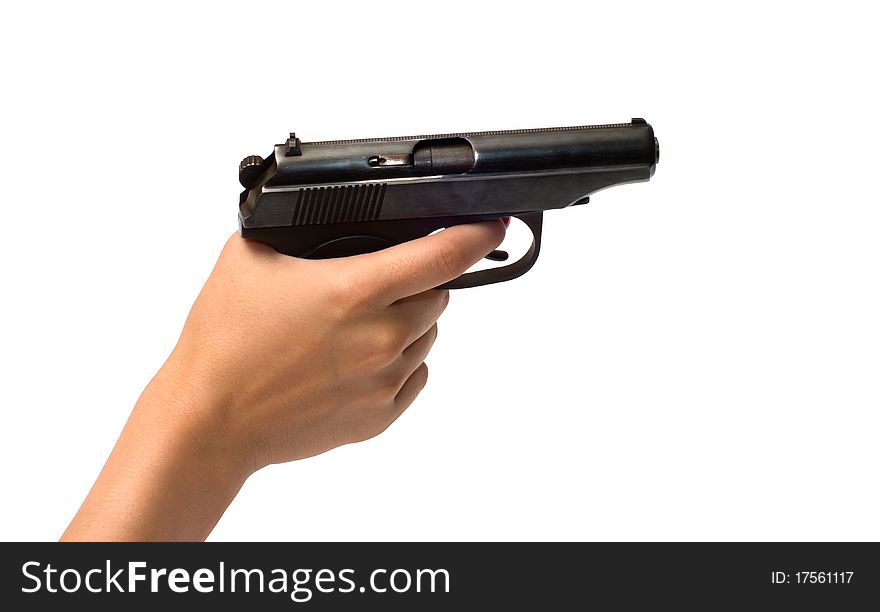 Female hand holds a pistol is isolated on a white background. Female hand holds a pistol is isolated on a white background.