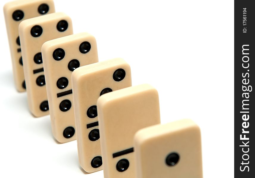 Chain of dominoes on a white background