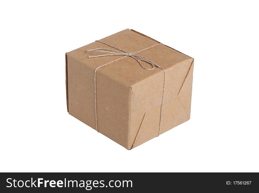 Packing box tied with a rope on a white background