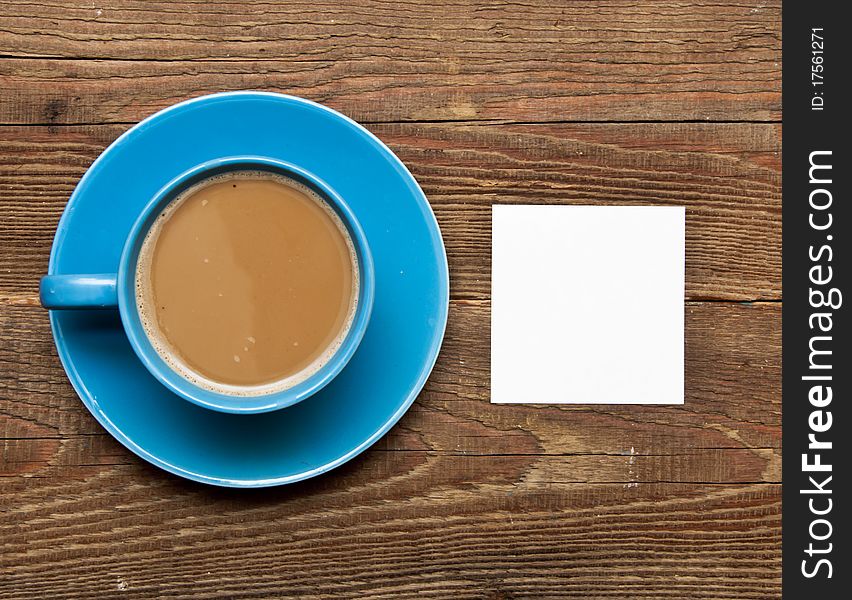 Blank card on coffee cup with space for your text