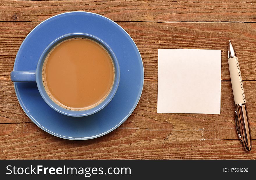 Blank card on coffee cup with space for your text