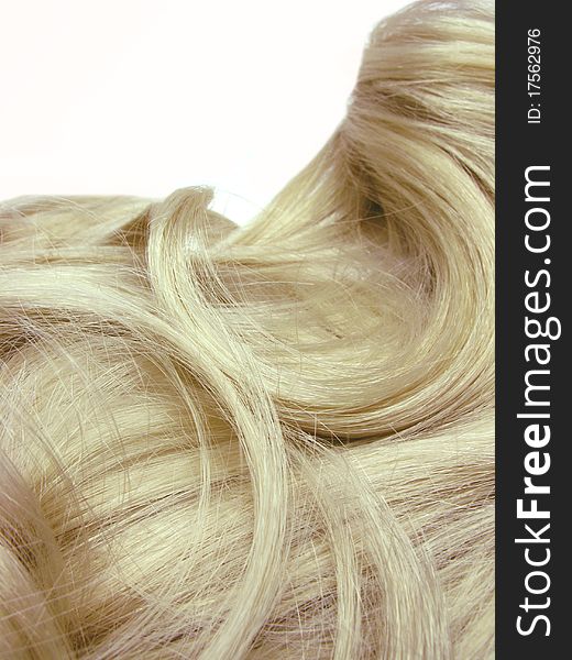 Blond hair texture isolated on white background