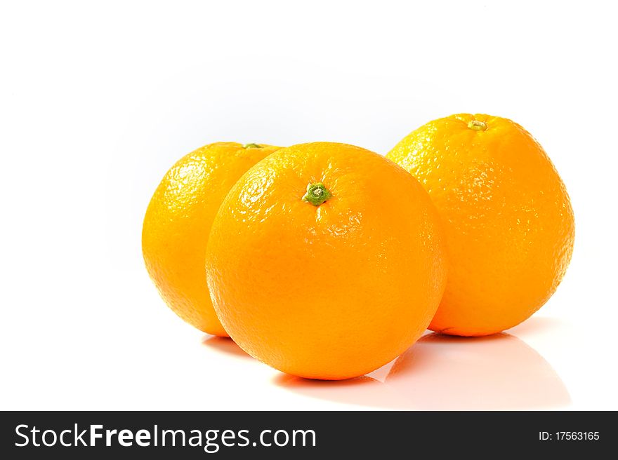 Close up of Oranges on White.