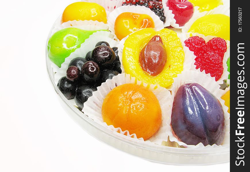 Marmalade gelatin fruits dessert covered with sugar isolated