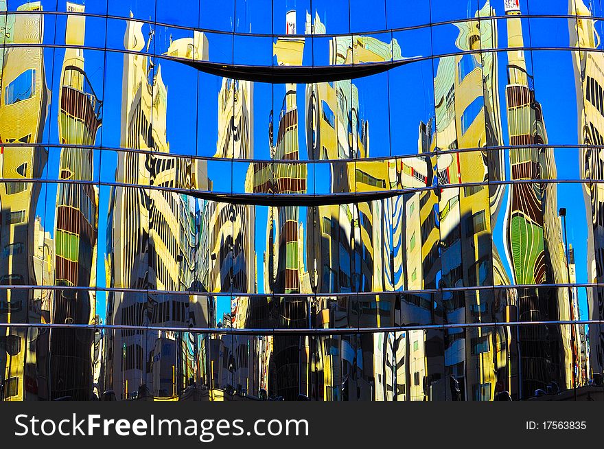 Unique reflections of buildings from a unique glass wall. Unique reflections of buildings from a unique glass wall