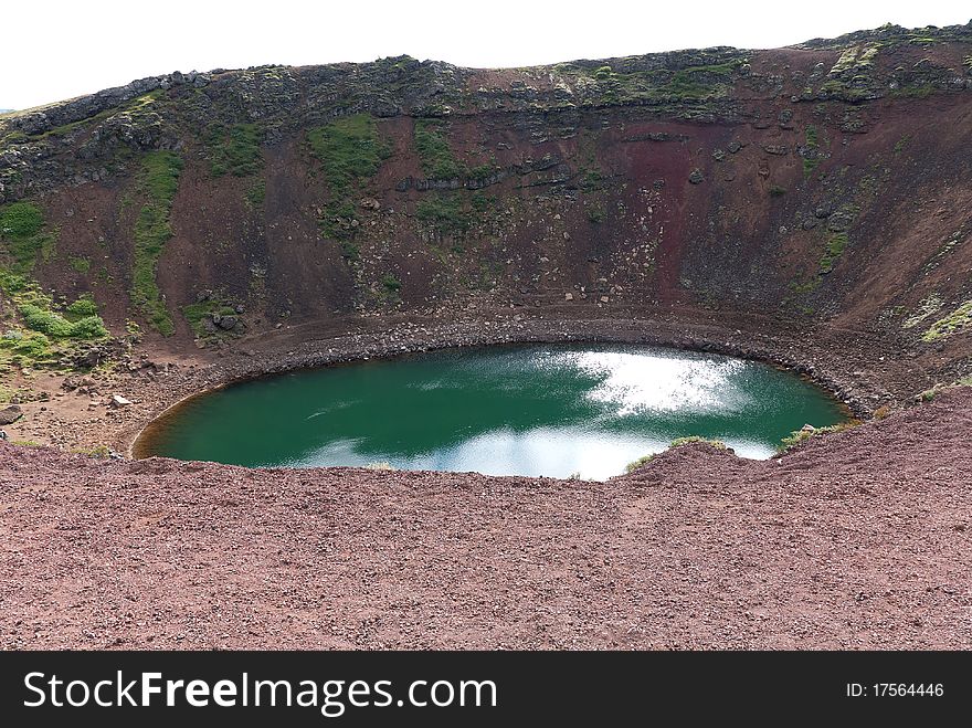 View of the lake was formed in the crater of an extinct volcano in Iceland kerid. View of the lake was formed in the crater of an extinct volcano in Iceland kerid