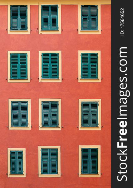 Photo of a facade with windows in the village of Camogli. Photo of a facade with windows in the village of Camogli