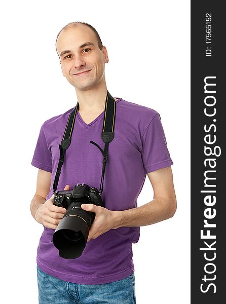 Handsome man with a photo camera. Isolated over white background