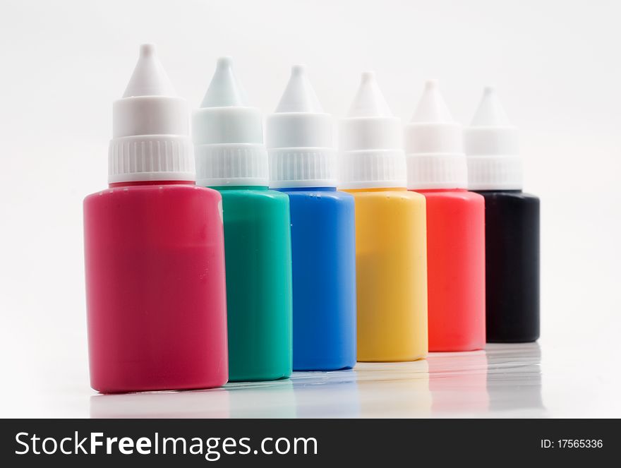 A set of plastic tubes with colored paint. A set of plastic tubes with colored paint
