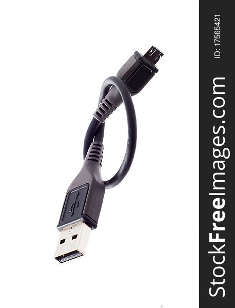 Black USB cable on white background