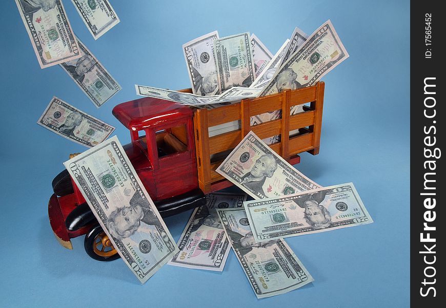 Truck with cash in bed and floating down from above. Truck with cash in bed and floating down from above.