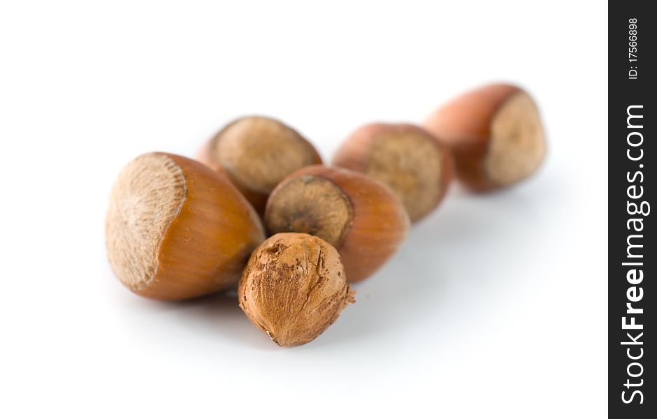 Heap of hazelnuts isolated on a white background. Heap of hazelnuts isolated on a white background