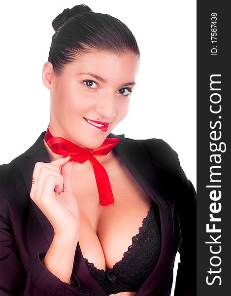 A beautiful sexy gril in a black anderwear with a red bow on her neck (isolated on white). A beautiful sexy gril in a black anderwear with a red bow on her neck (isolated on white)