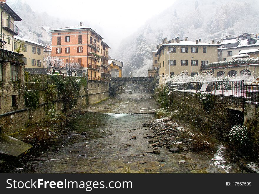 Torrent in the country with snow