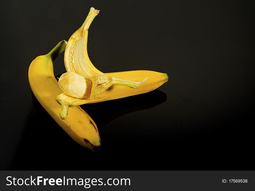 An image of bananas on a black background