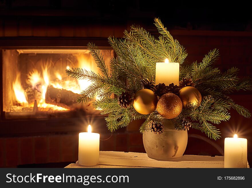 Christmas floral decoration in front of firepace