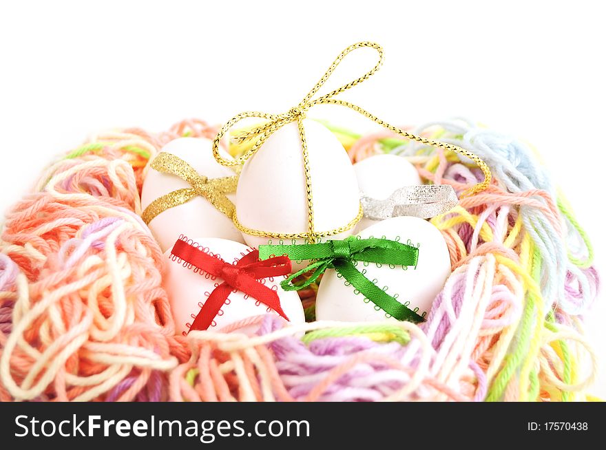 Easter eggs in a nest from threads