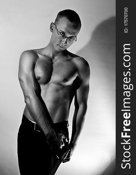 Muscular man with relief muscles. Black and white