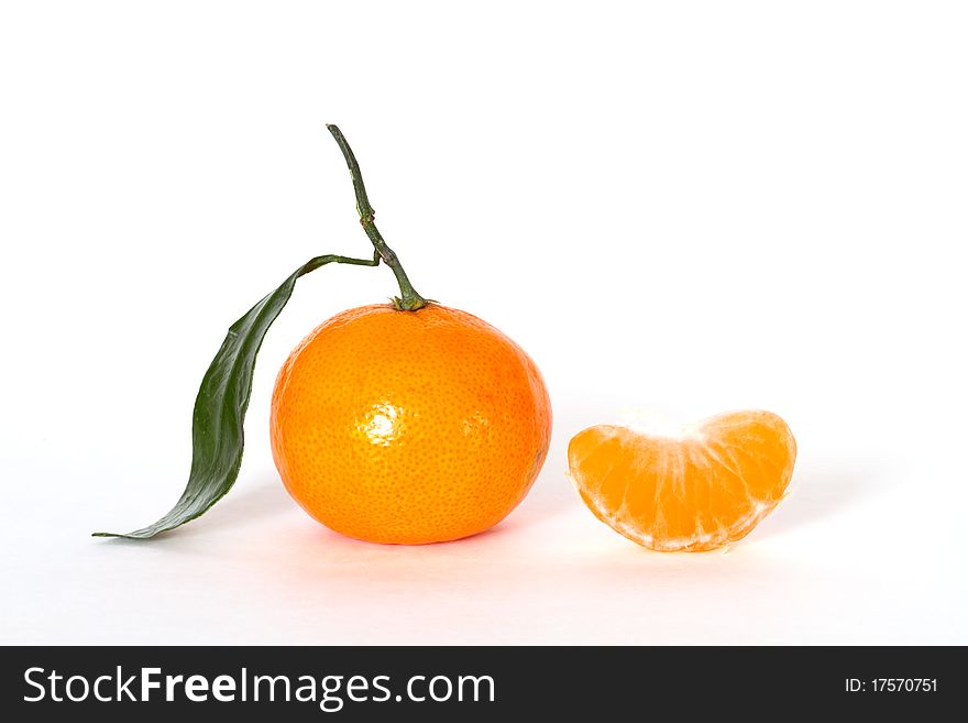 Tangerine with leaf isolated on white. Tangerine with leaf isolated on white