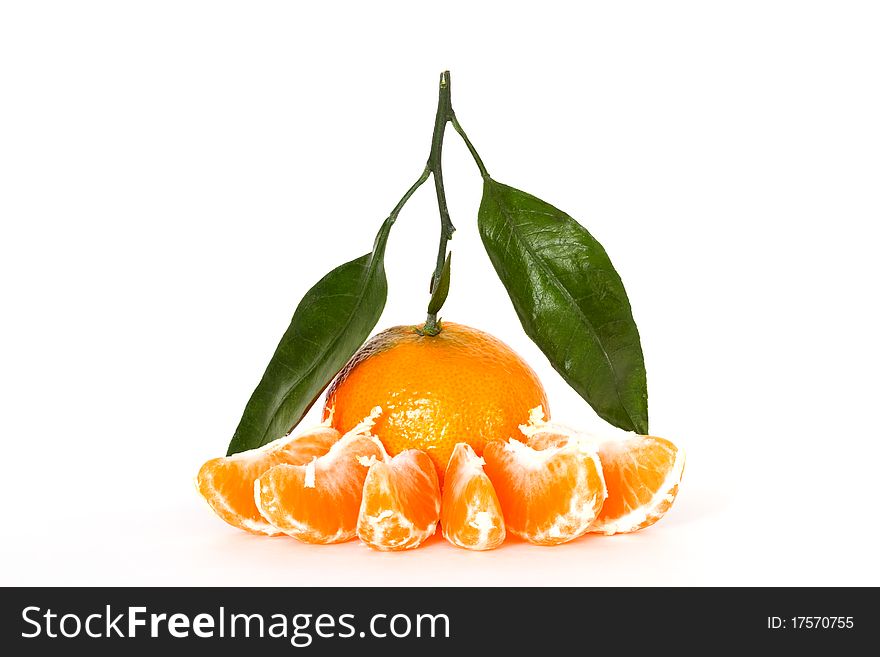 Tangerine with leafs isolated on white