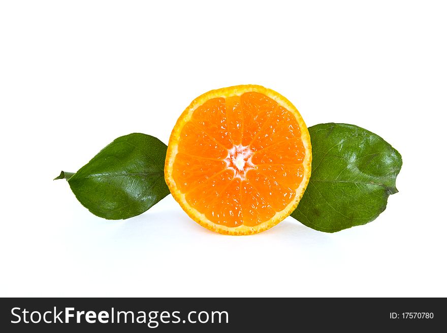 Fresh tangerine with leafs isolated on white