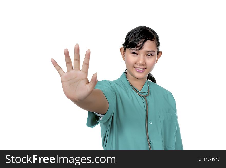 A Doctor wearing scrub say stop isolated over white background. A Doctor wearing scrub say stop isolated over white background