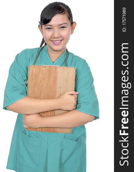 A Doctor wearing scrub hold paperboard isolated over white background. A Doctor wearing scrub hold paperboard isolated over white background