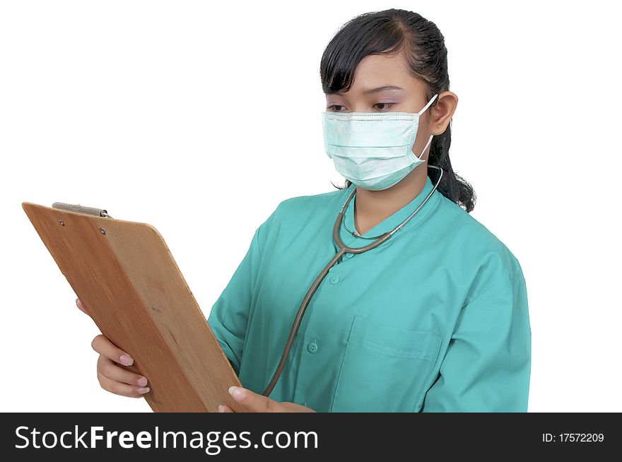 A Doctor wearing scrub hold paperboard isolated over white background. A Doctor wearing scrub hold paperboard isolated over white background