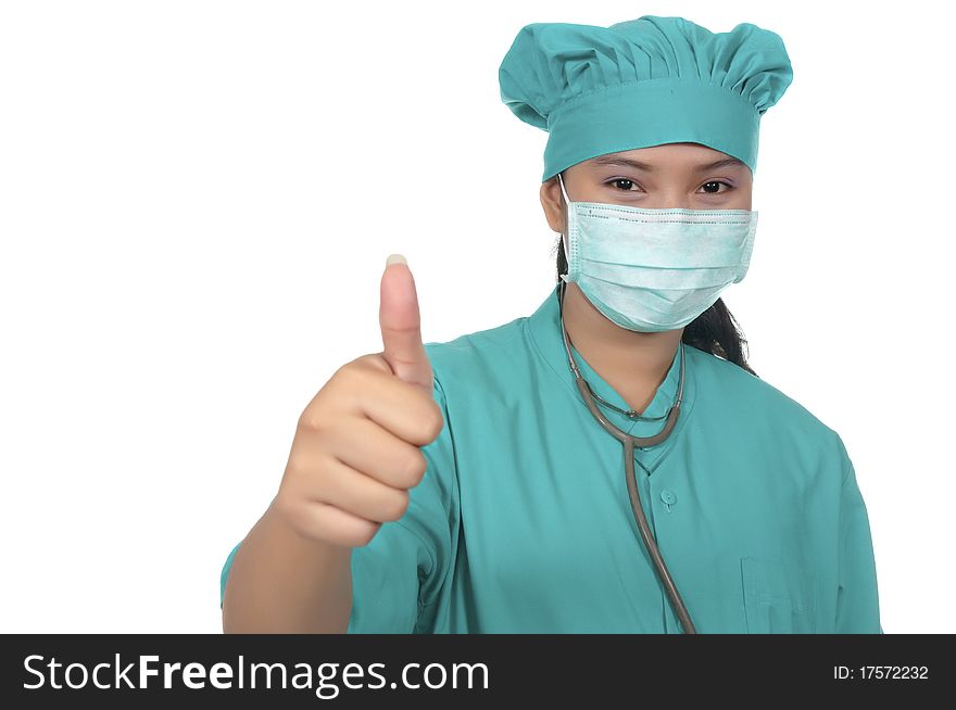 A Doctor wearing scrub and show her thumb isolated over white background. A Doctor wearing scrub and show her thumb isolated over white background