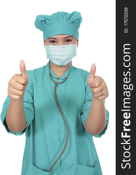 A Doctor wearing scrub and show her thumb isolated over white background. A Doctor wearing scrub and show her thumb isolated over white background