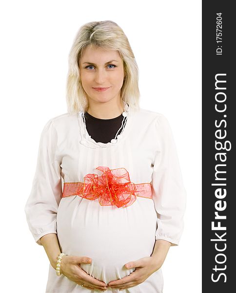 Portrait of pregnant woman with red bow isolated on white