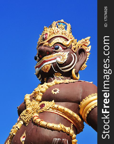 Brown Giant In Thai Temple,north Of Thailand