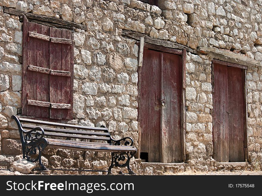 Greek traditional house and bench
