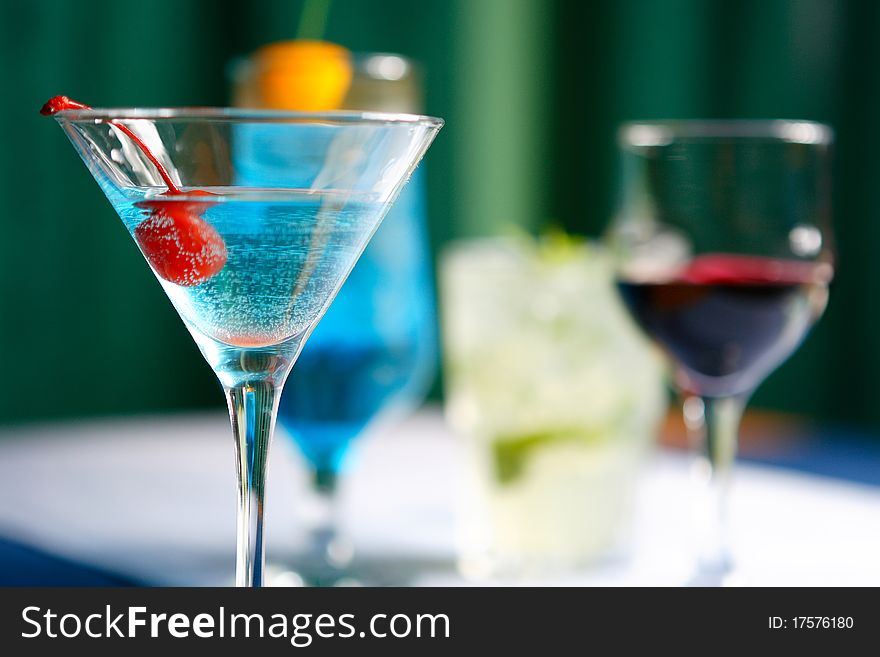 Cocktails of different colors and glasses alcoholic and nonalcoholic for a relaxation
