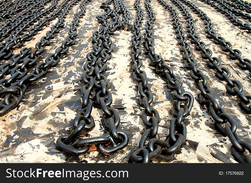 Ships anchor chain on the floor after painting