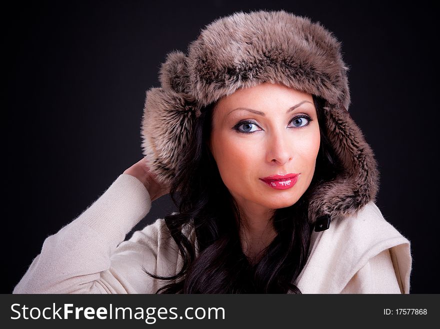 Attractive girl in winter fur hat