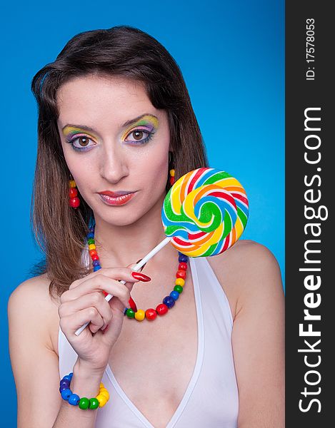 Portrait of wonderful girl with large eyes and lollipop. Portrait of wonderful girl with large eyes and lollipop