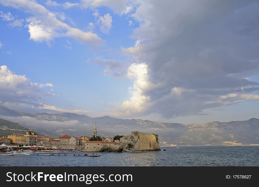 Ancient city on the sea, sky, mountains