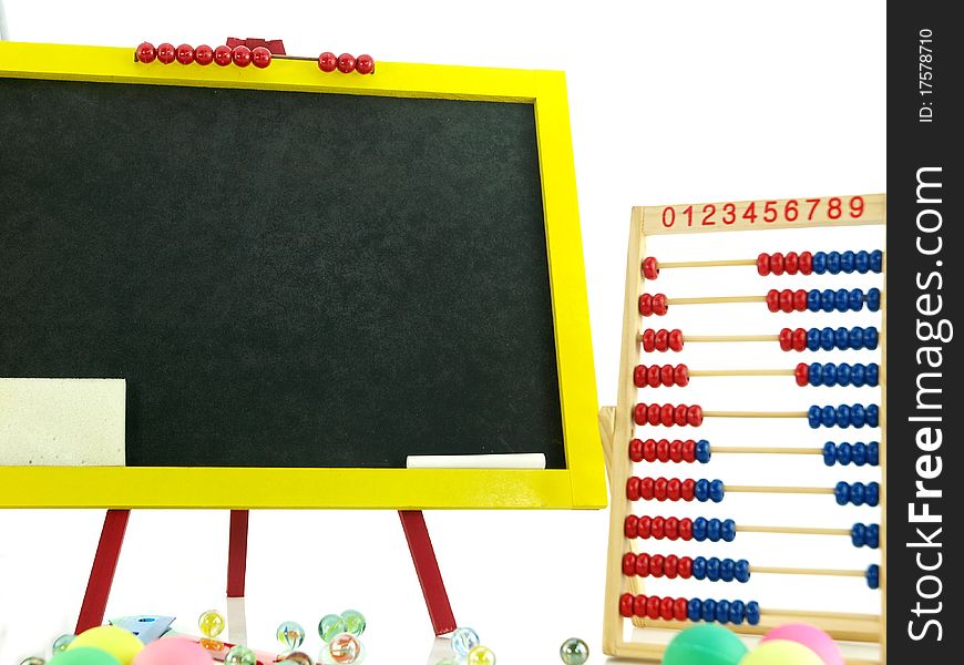 Colorful blackboard with abacus and marbles