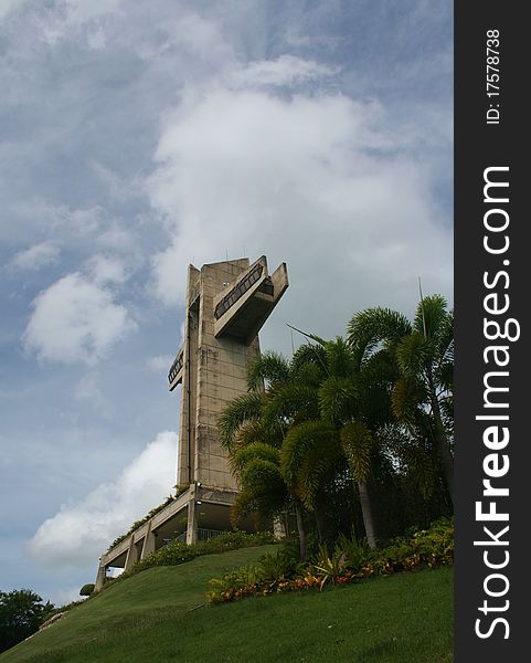 A large concrete cross on a hill above the city of Ponce, Puerto Rico, USA. A large concrete cross on a hill above the city of Ponce, Puerto Rico, USA.