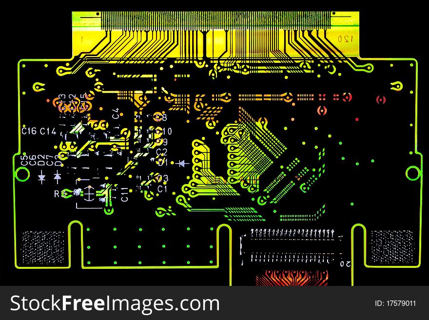 Glowing printed circuit board macro detail. Glowing printed circuit board macro detail