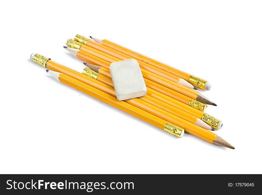 Pencils and eraser isolated on white