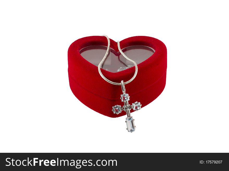 Red heart and cross on white background