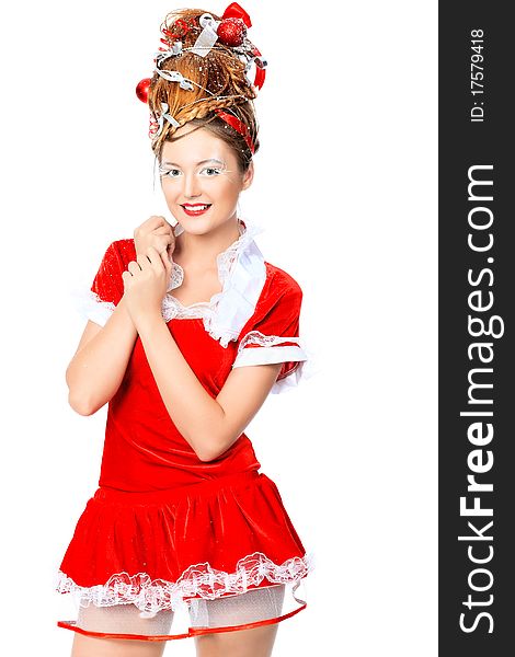 Beautiful young woman in Santa Claus clothes, isolated over white background. Beautiful young woman in Santa Claus clothes, isolated over white background.