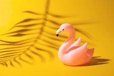 Summer Vacation Concept With Toy Flamingo On Yellow Background, Creative Pastel Royalty Free Stock Image