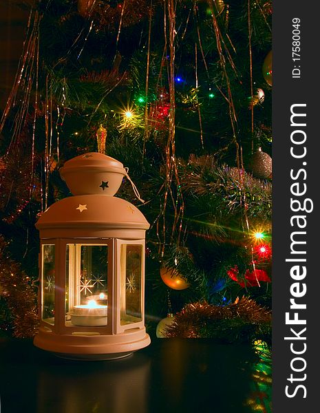 Christmas candlestick lamp near christmas tree. Christmas candlestick lamp near christmas tree