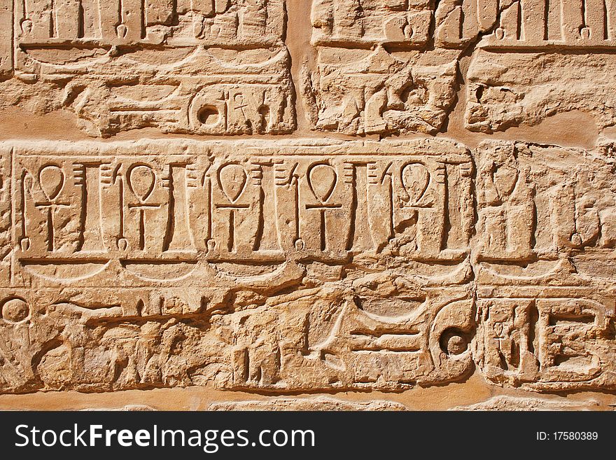 Old egypt hieroglyphs carved on the stone