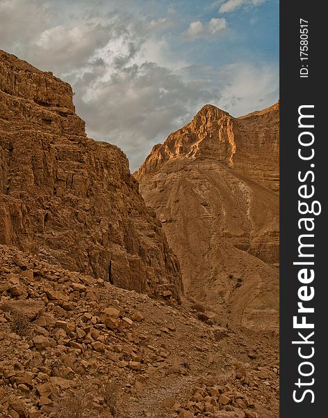 A detailed view of the cliffs around Ein Gedi Nature reserve in the morning light. A detailed view of the cliffs around Ein Gedi Nature reserve in the morning light.